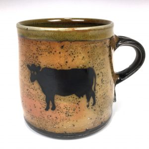 Cylinadr mug with a cow