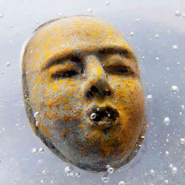 Experimental Mask Paperweight by Paul Stankard